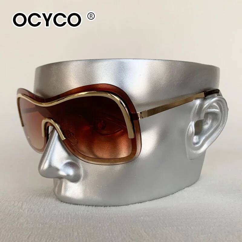 Women Fashion Pose - แว่นกันแดด OCYCO 2026 แฟชั่นใหม่ ทรงเก๋ ไร้กรอบ